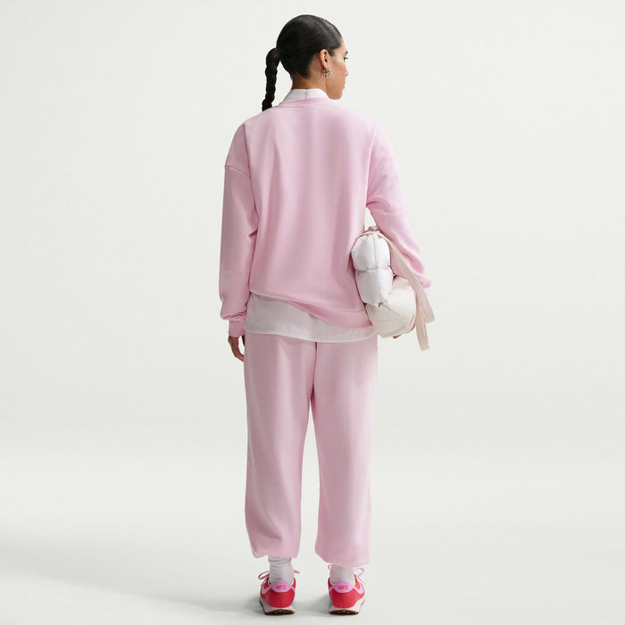 Women’s pink fleece jogger pants, back view, elastic waistband and ankle cuffs
