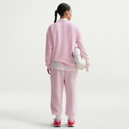 Women’s pink fleece jogger pants, back view, elastic waistband and ankle cuffs