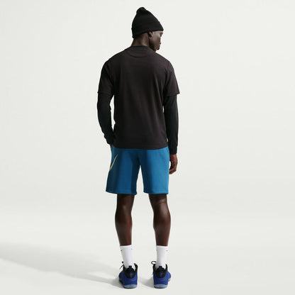 Blue fleece shorts with elastic waistband and Nike swoosh on back leg panel