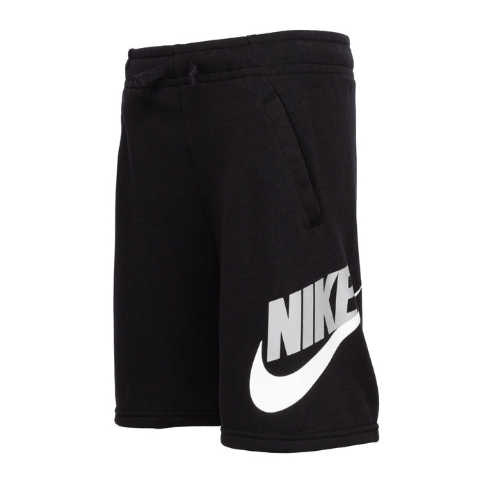 Youth black Nike shorts, side view with large white swoosh on leg