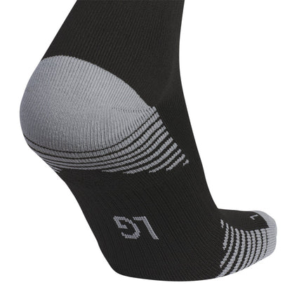 Black cushioned sock with gray toe pad and small white logo on instep