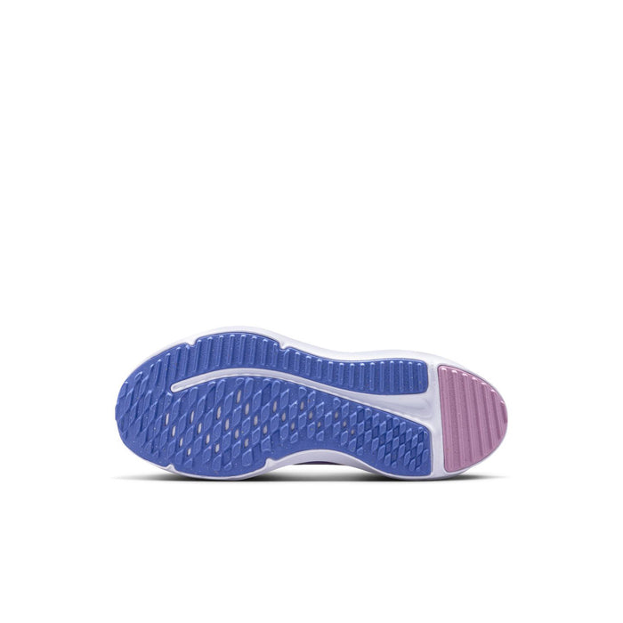 Kids shoe outsole with blue tread pattern and pink rubber sidewall.