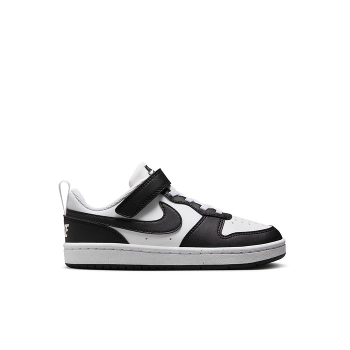 Kids low-top sneakers in white with black overlays and Nike swoosh, hook-and-loop strap