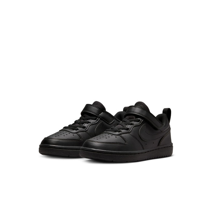 Kids black low-top sneakers, side view, with hook-and-loop strap and laces