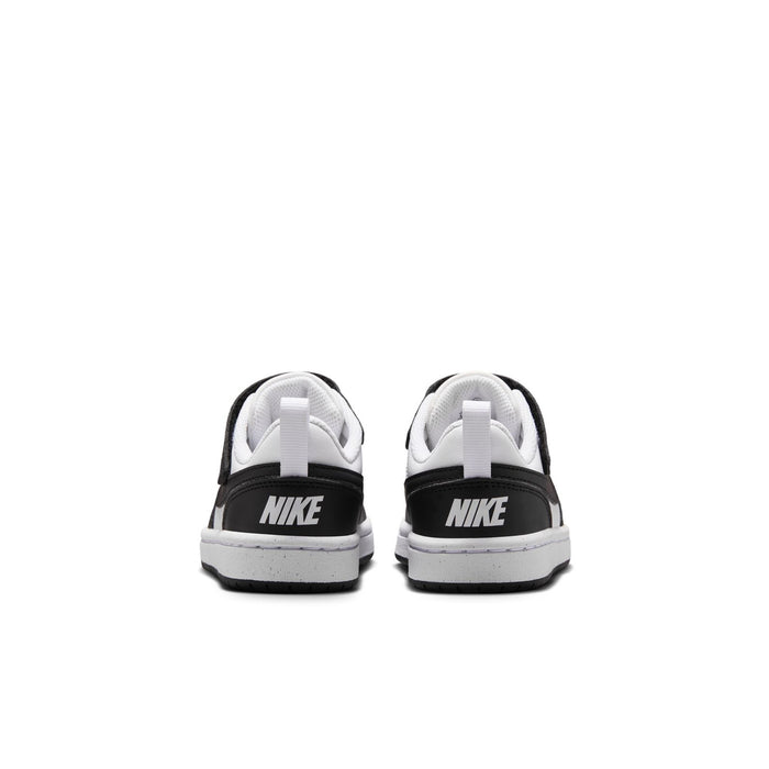 Kids low-top sneakers with black heel panel and Nike logo, white and black colorway