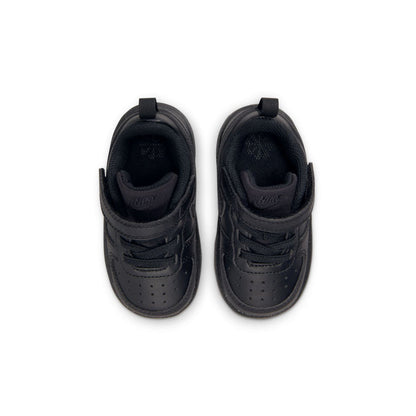 Toddler black low-top sneakers showing padded collars and interior lining