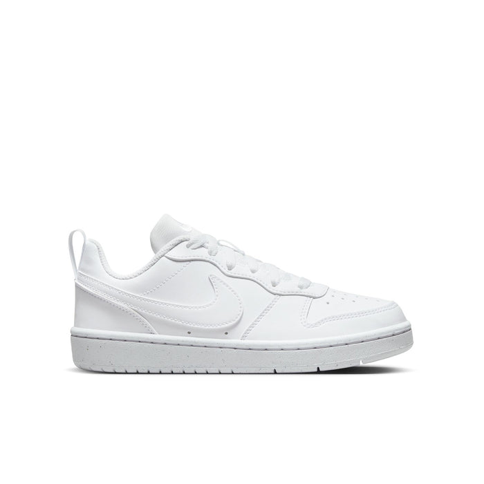 Youth white low-top sneakers with Nike swoosh and lace-up front