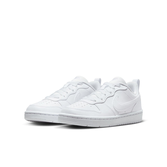 Youth white low-top sneakers, double view with Nike swoosh and lace-up