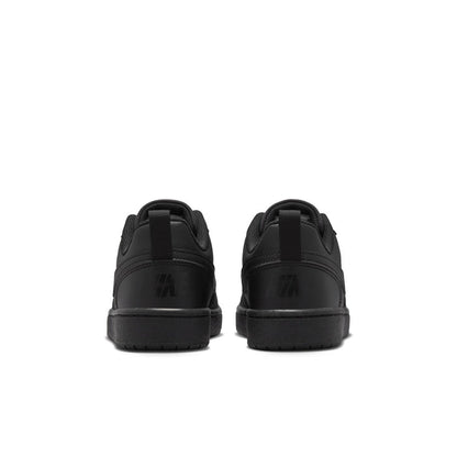 Youth black low-top sneakers from the back with cushioned heel and tabs
