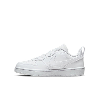 Youth white low-top sneakers, side profile with Nike swoosh and cupsole