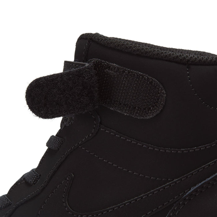 Kids black mid-top sneaker tongue and padded collar