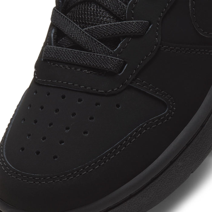 Kids black upper with perforated toe and stitched swoosh
