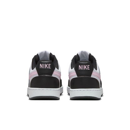 Back view of low-top sneakers with NIKE branding on black heel tabs and white midsoles