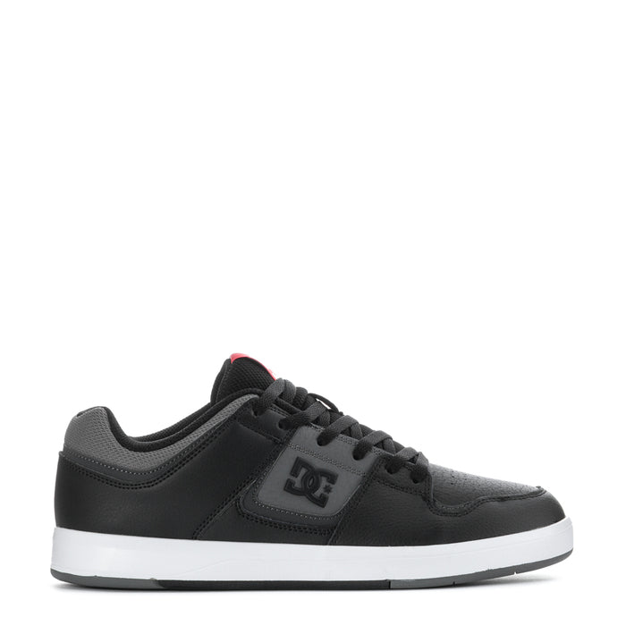 Men's black and grey sneakers with DC logo patch and lace-up design