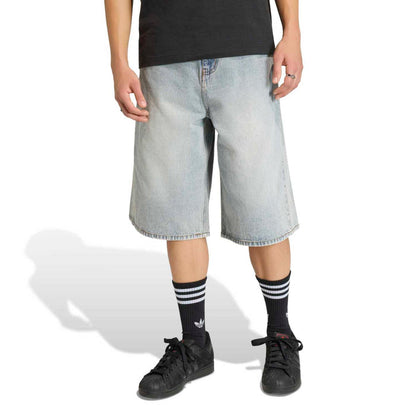 Light blue denim knee-length shorts with roomy fit and front button closure.