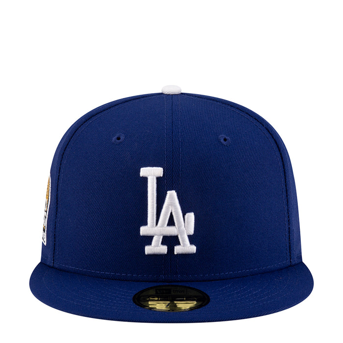 Blue Dodgers baseball cap with white LA logo on front and gold side patch