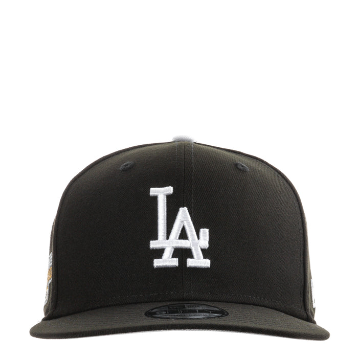 Black baseball cap with white LA logo on front