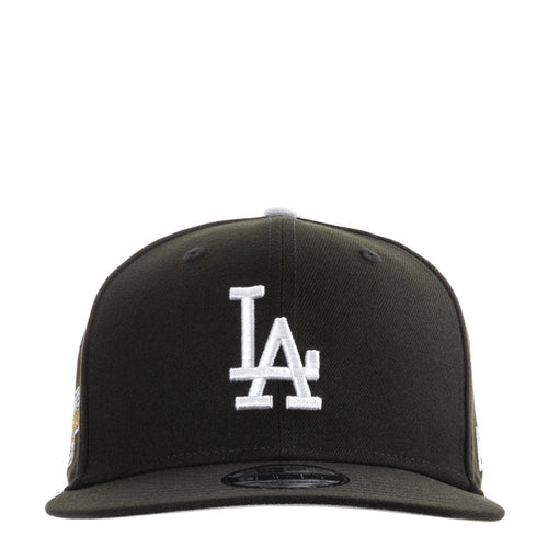 Black baseball cap with white LA logo on front