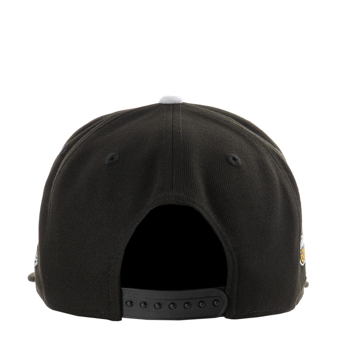 Black baseball cap back view with snapback strap and ventilation eyelets