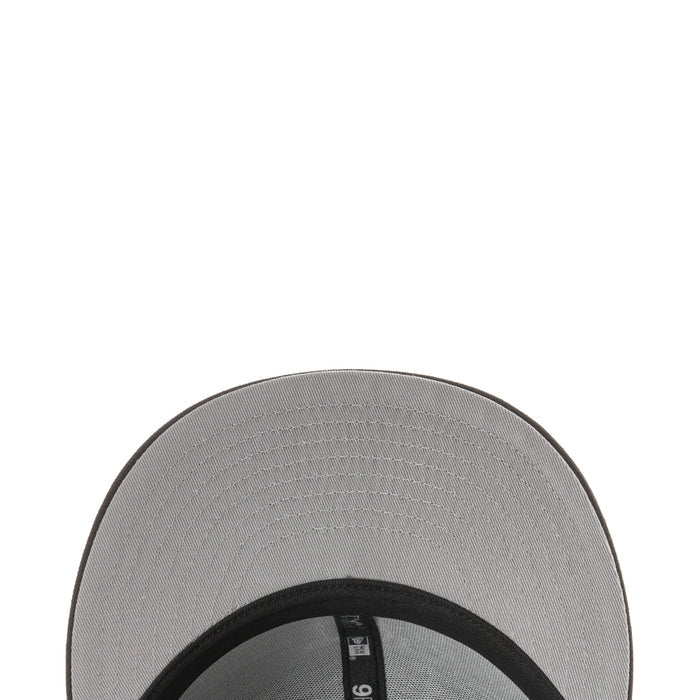 Light gray underside of baseball cap brim with black inner band