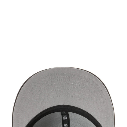 Light gray underside of baseball cap brim with black inner band