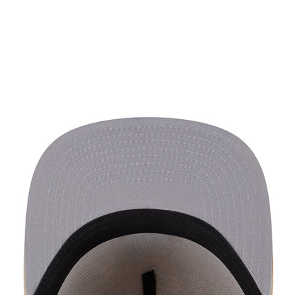 Gray baseball cap close-up with black inner band and textured top panel