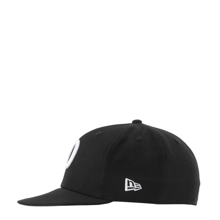 Black baseball cap with New Era flag logo on front