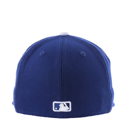 Royal blue baseball cap with white MLB logo patch at the back