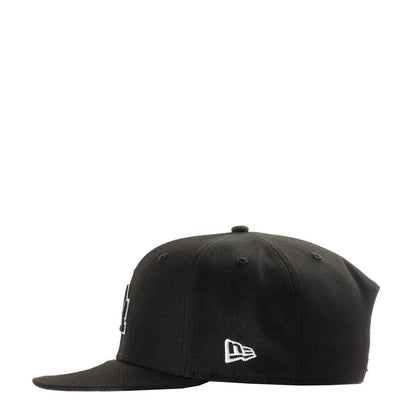 Black baseball cap with small New Era flag logo on front