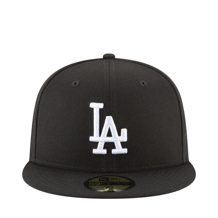 Black baseball cap with large white LA logo on front panels