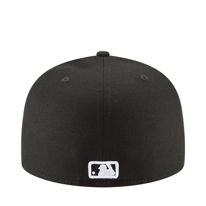 Black baseball cap with white MLB logo patch on back panel
