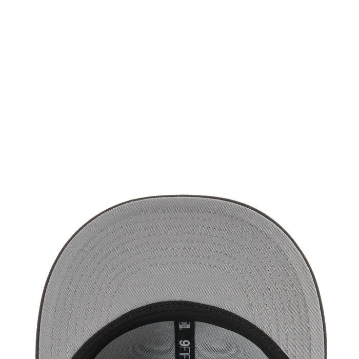 Black baseball cap interior with gray mesh lining and stitched brim edge