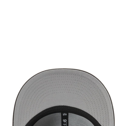 Black baseball cap interior with gray mesh lining and stitched brim edge