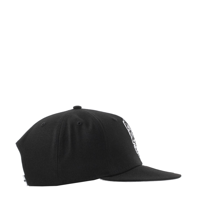 Black baseball cap side profile with white embroidered detail along the back panel