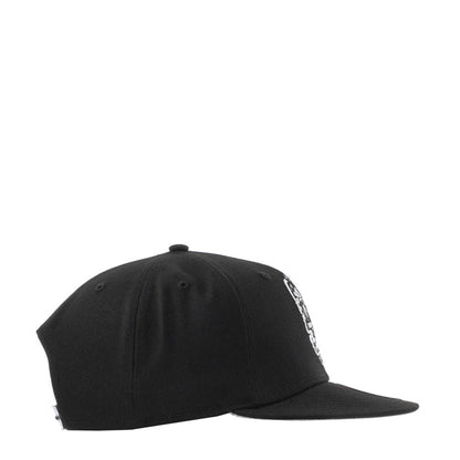 Black baseball cap side profile with white embroidered detail along the back panel