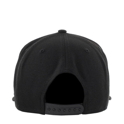 Black baseball cap back view with adjustable strap and ventilation eyelets