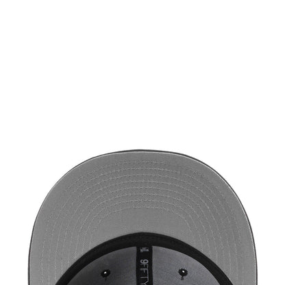 Gray underbrim and inner seam detail of the black baseball cap