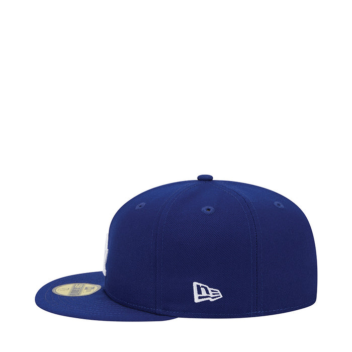 Royal blue baseball cap with New Era side logo patch