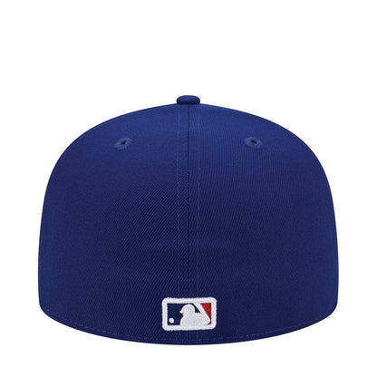 Royal blue baseball cap with MLB logo patch on back