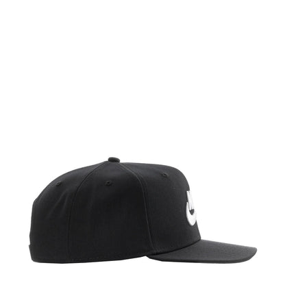 Black Nike snapback cap, side view with white Swoosh