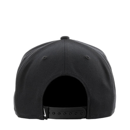 Black Nike cap back with adjustable strap and metal grommets