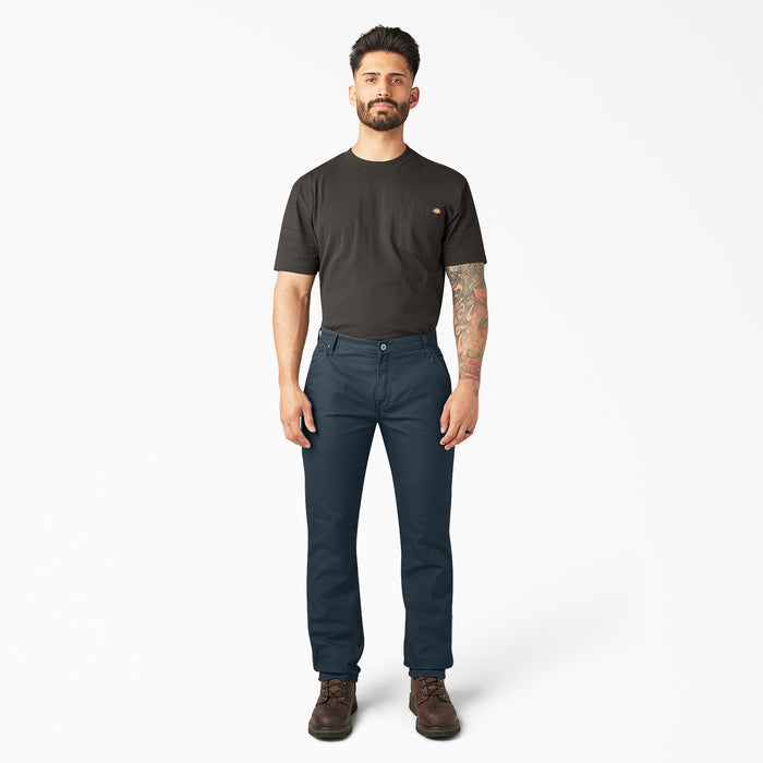 Mens dark blue carpenter pants, full front view with button fly and belt loops