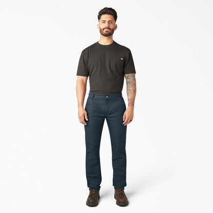 Mens dark blue carpenter pants, full front view with button fly and belt loops