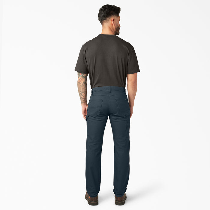 Mens dark blue carpenter pants, rear view with straight legs and back yoke seam