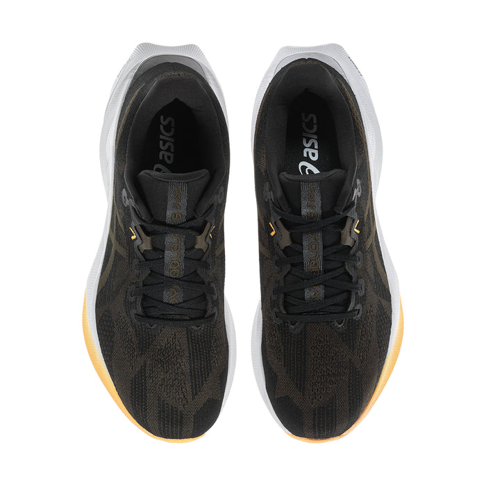 Men's black running shoes, top view showing padded tongue and lace-up interior