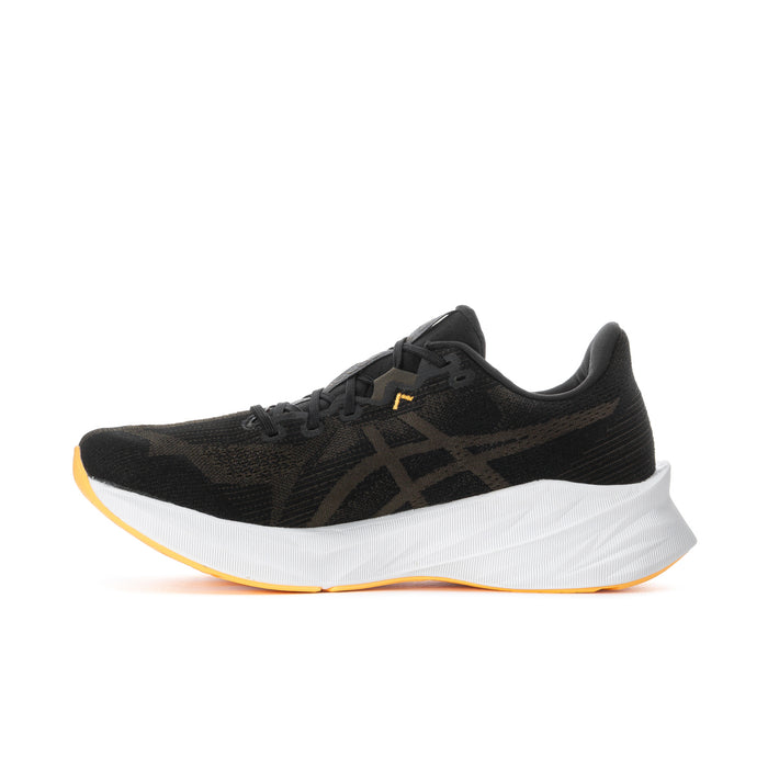 Men's black running shoes side view with white sole and orange logo accents