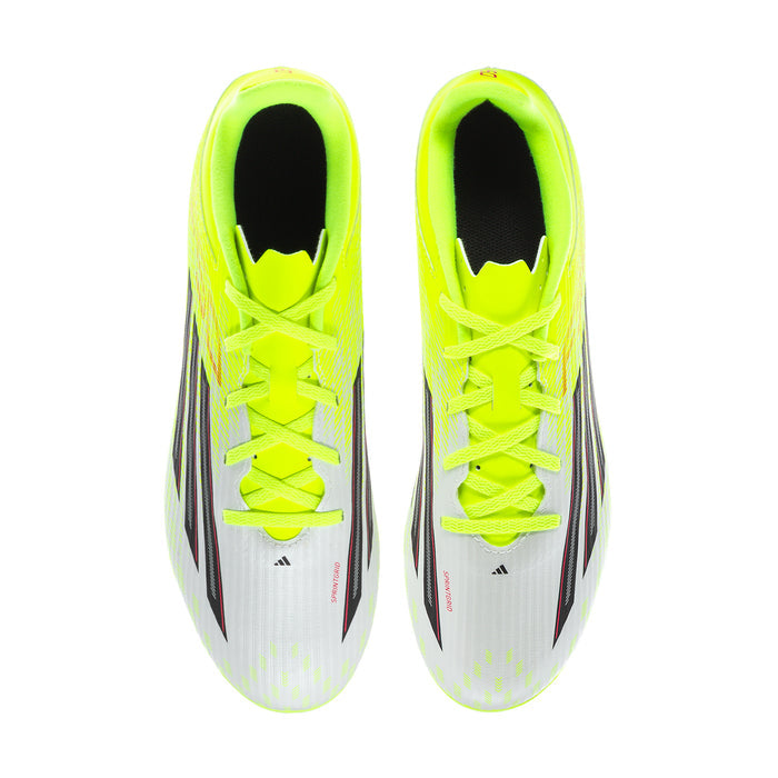 Men's soccer cleat pair front view in neon yellow with black interior lining