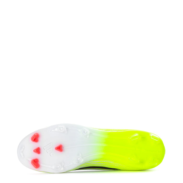 Neon green soccer cleats with white sole and red stud tips, underside view
