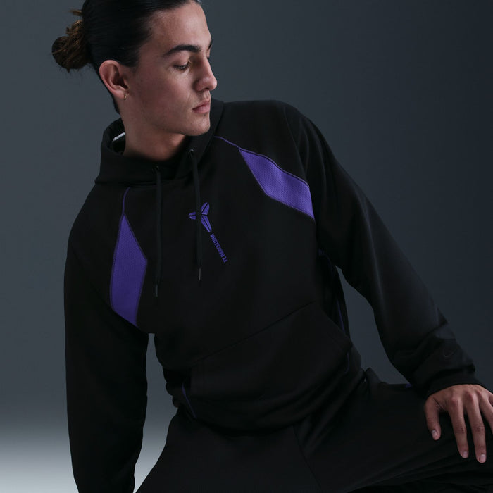 Men's black hoodie with purple shoulder panel and drawstring hood, side view.