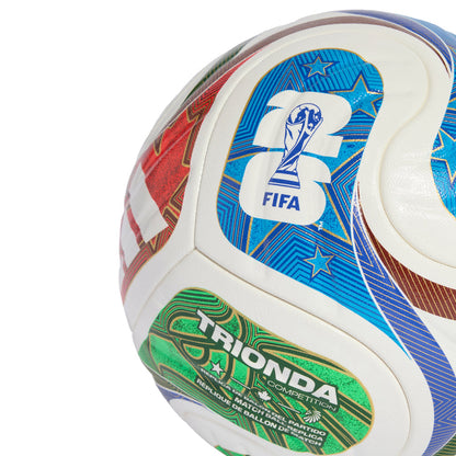 Competition soccer ball close-up with FIFA player badge in blue and red print